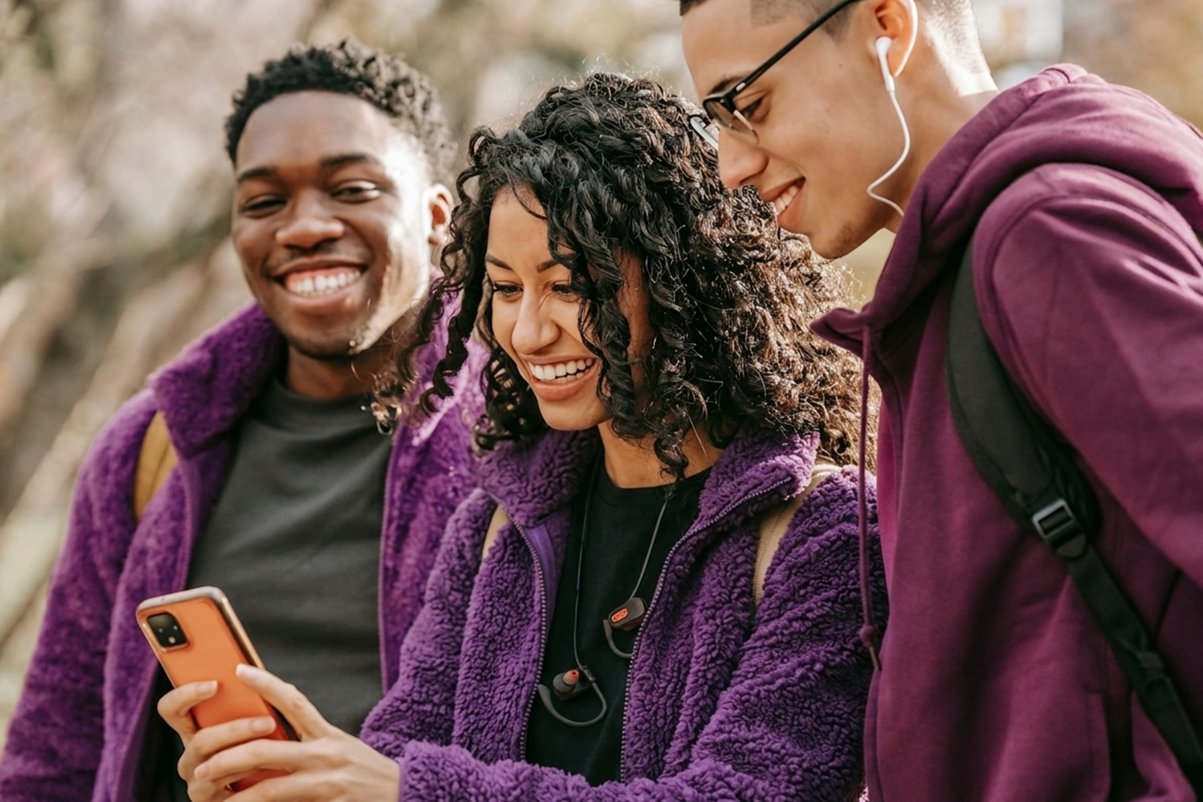 Young people using AdventBuddy on their phones